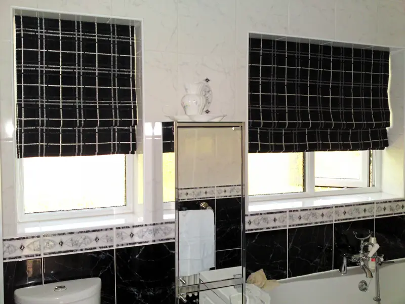 Check Roman blinds in a bathroom by Heather Horrocks Leigh