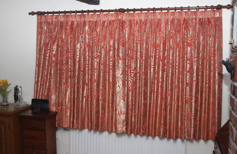 Coral pencil pleat curtains by Heather Horrocks Leigh
